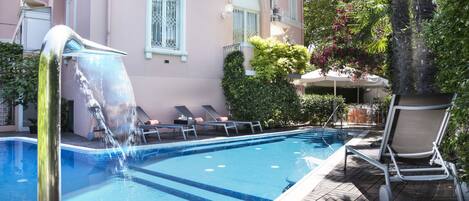 Indoor pool, outdoor pool, open 9:30 AM to 7 PM, pool loungers