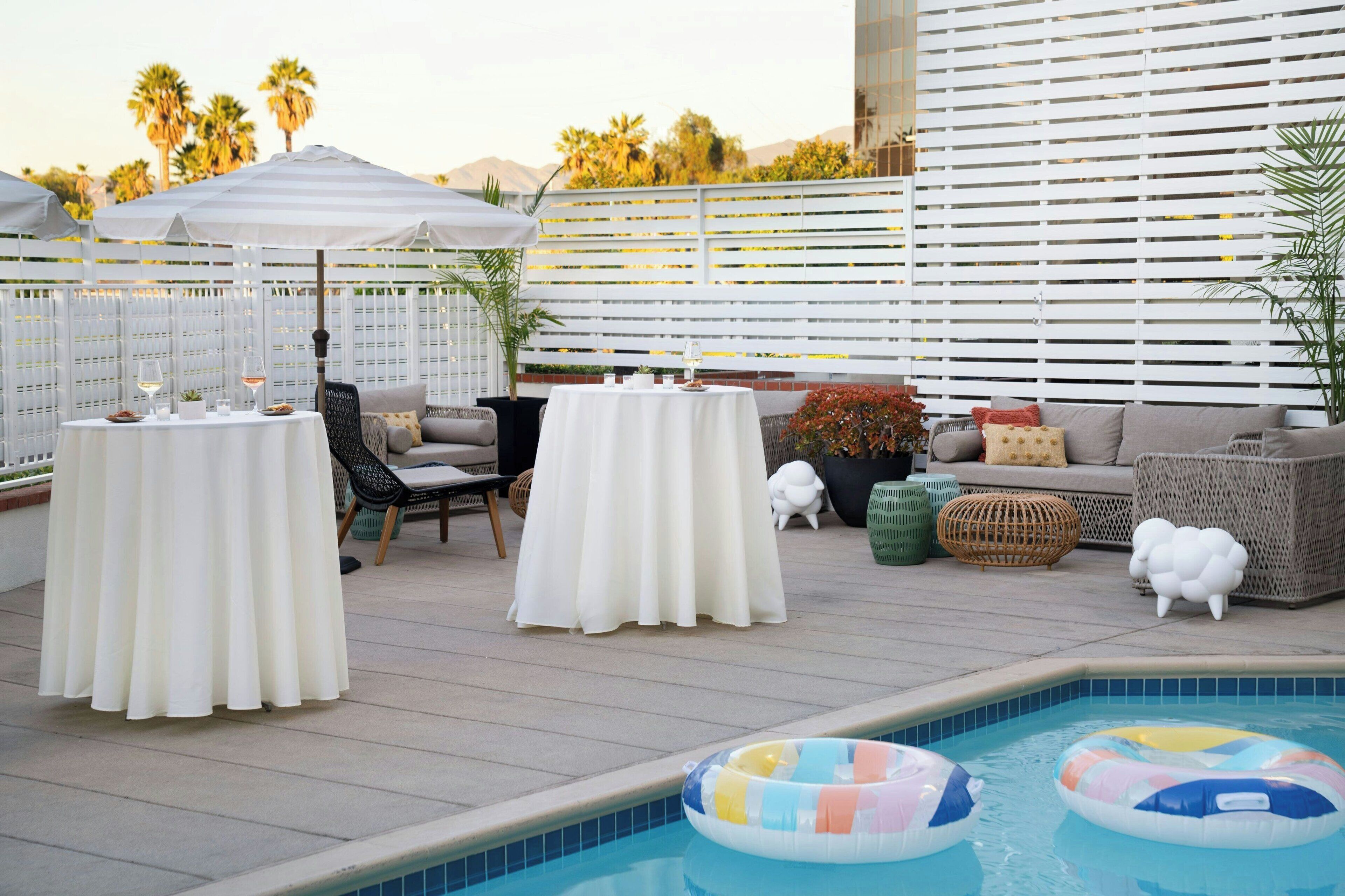 Outdoor pool, open 8:00 AM to 9:00 PM, pool umbrellas, pool loungers