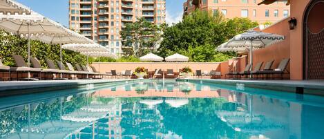 Outdoor pool, open 7 AM to 10 PM, pool umbrellas, sun loungers