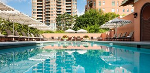 Outdoor pool, pool umbrellas, sun loungers