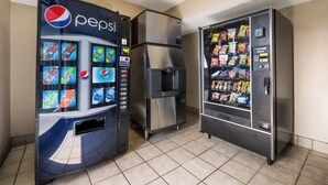 A vending machine area with a Pepsi machine and a snack vending machine. - Red Roof Inn PLUS+ Nashville Airport (Nashville)