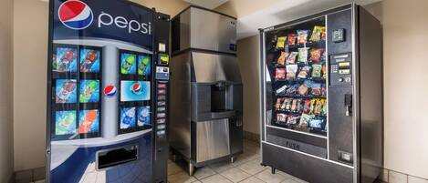 A vending machine area with a Pepsi machine and a snack vending machine.
