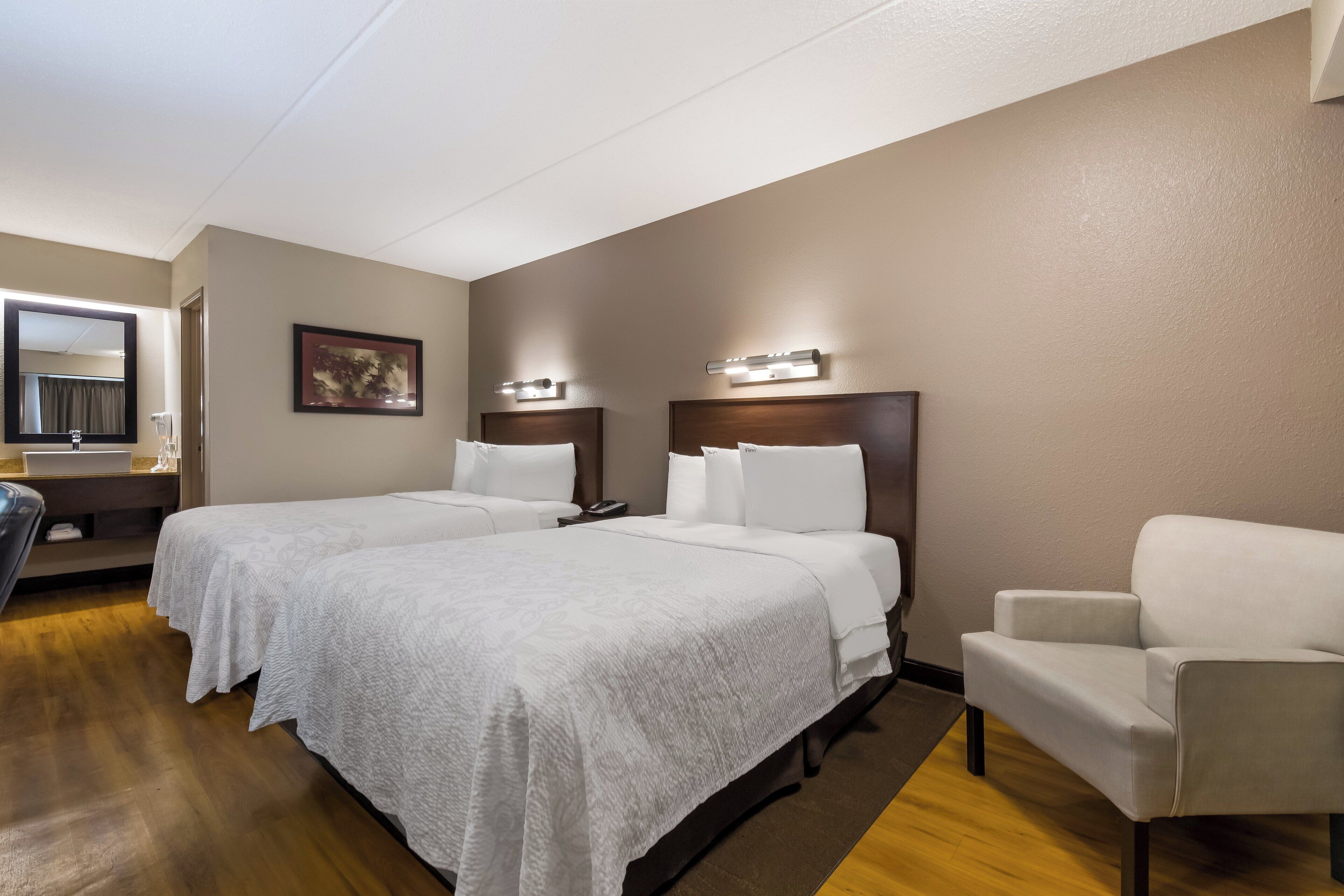 deluxe room, 2 double beds (smoke free) | blackout curtains, iron/ironing board, free wifi, bed sheets