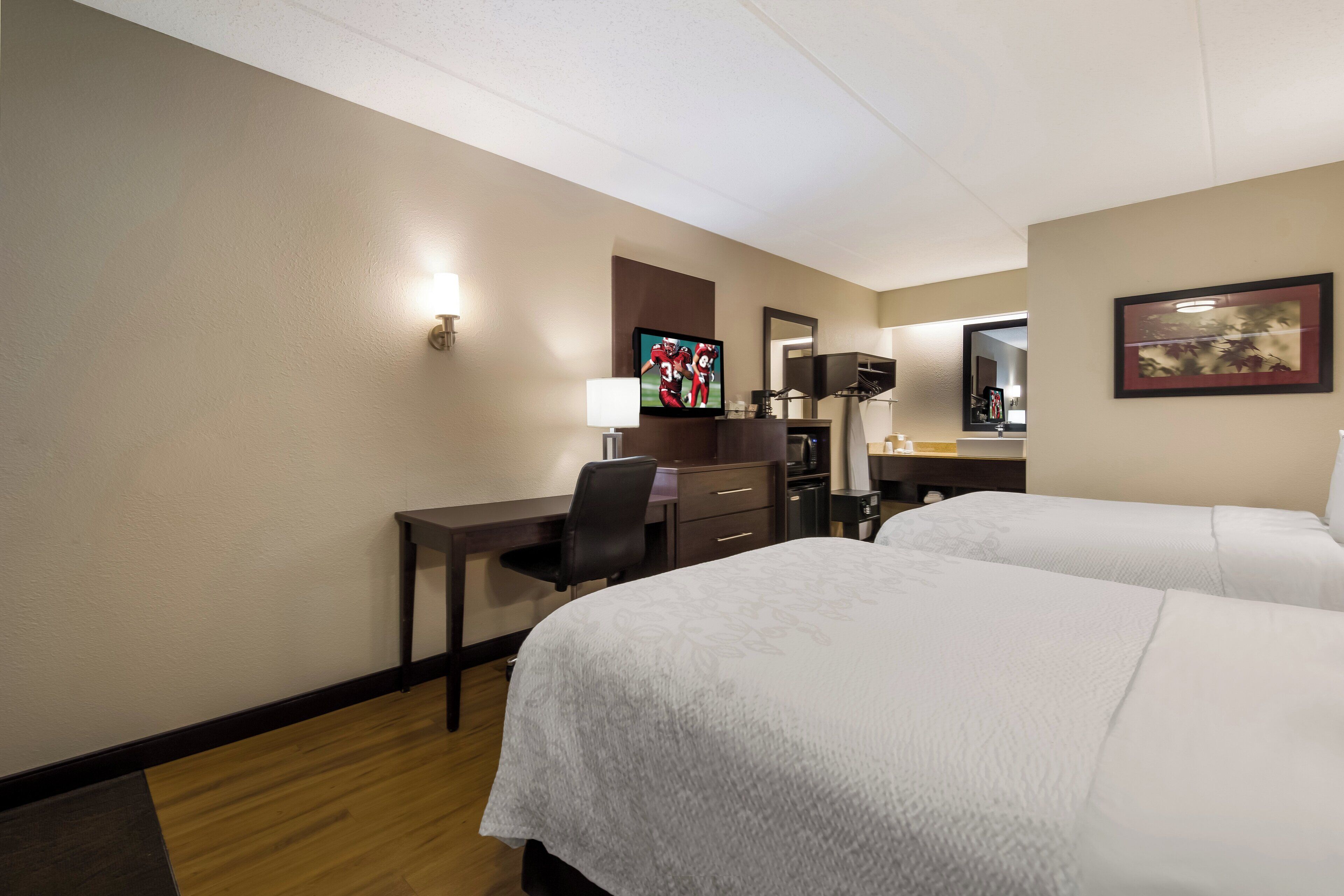 deluxe room, 2 double beds (smoke free) | blackout curtains, iron/ironing board, free wifi, bed sheets