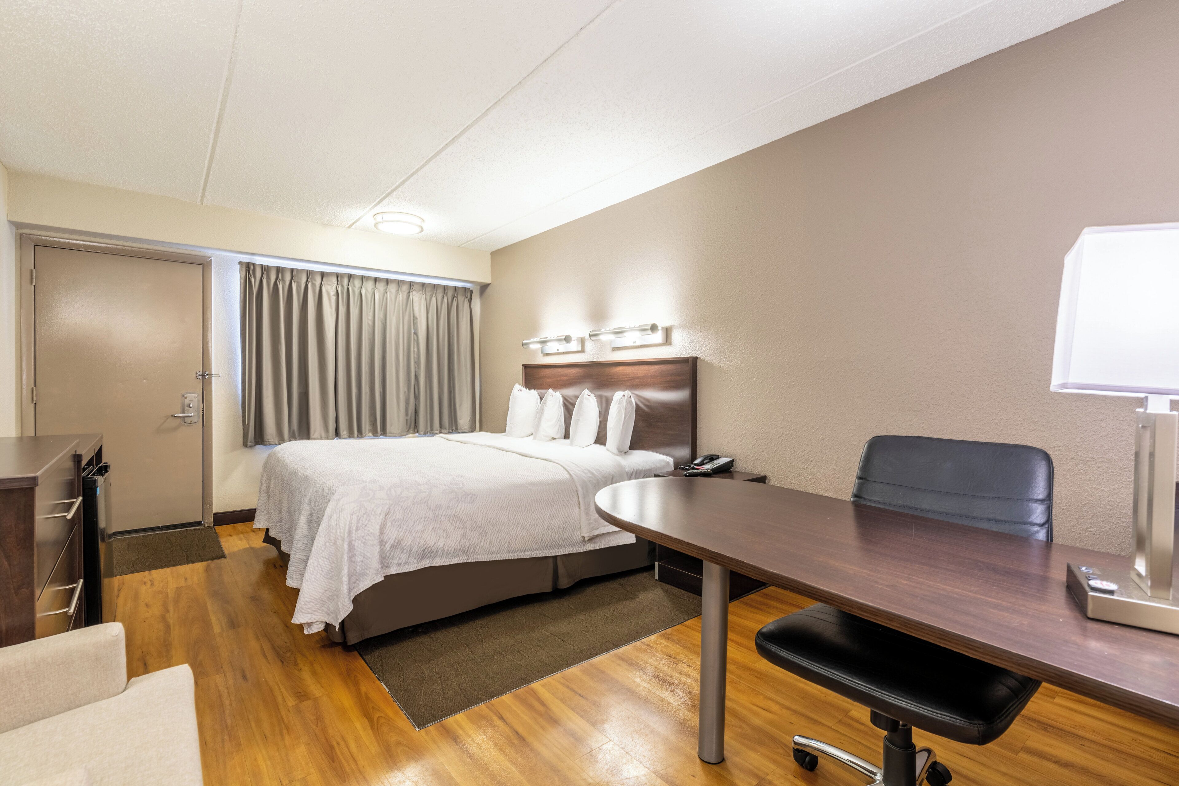 superior room, 1 king bed (smoke free) | blackout curtains, iron/ironing board, free wifi, bed sheets