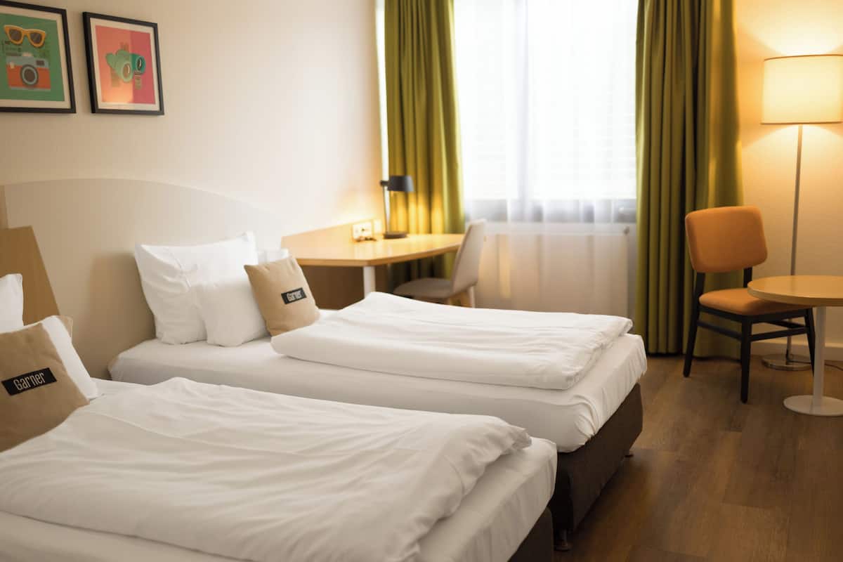 Standard Room, 2 Twin Beds | In-room safe, desk, laptop workspace, blackout drapes