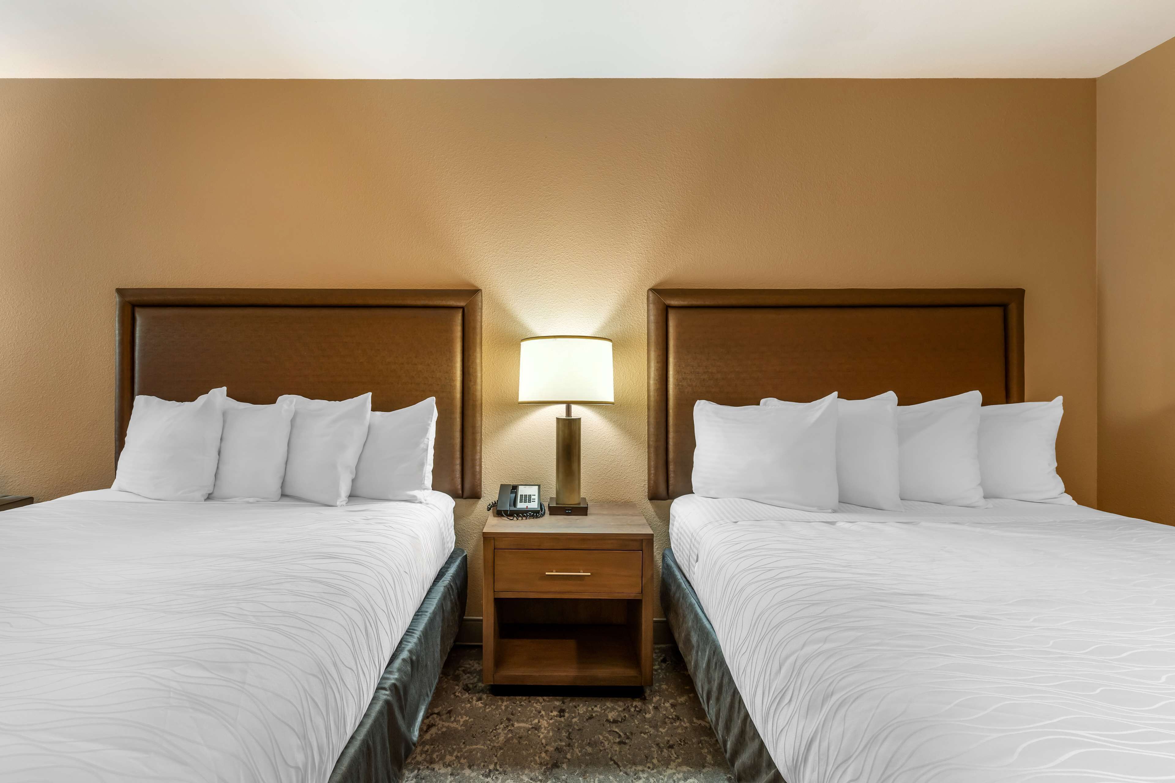 standard room, 2 queen beds, non smoking, refrigerator | desk, iron/ironing board, free wifi, bed sheets