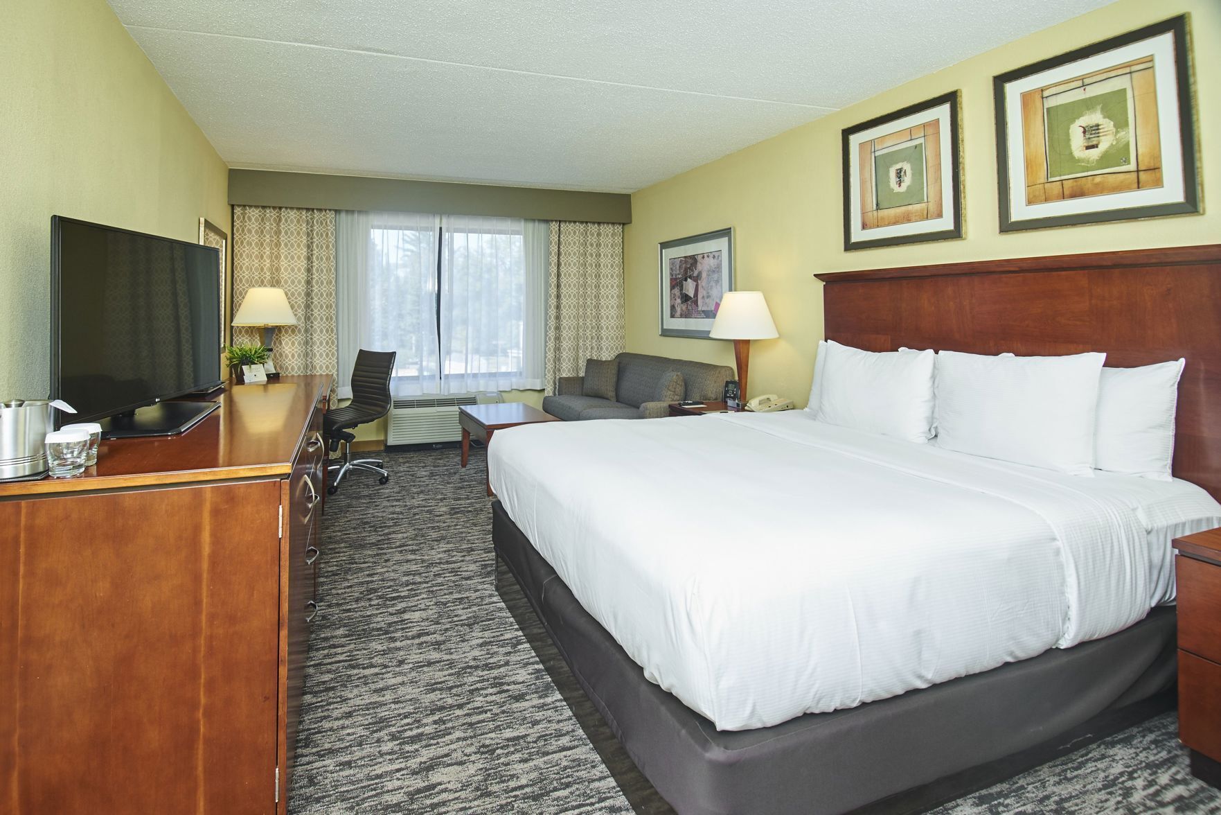 Premium bedding, down comforters, pillowtop beds, in-room safe