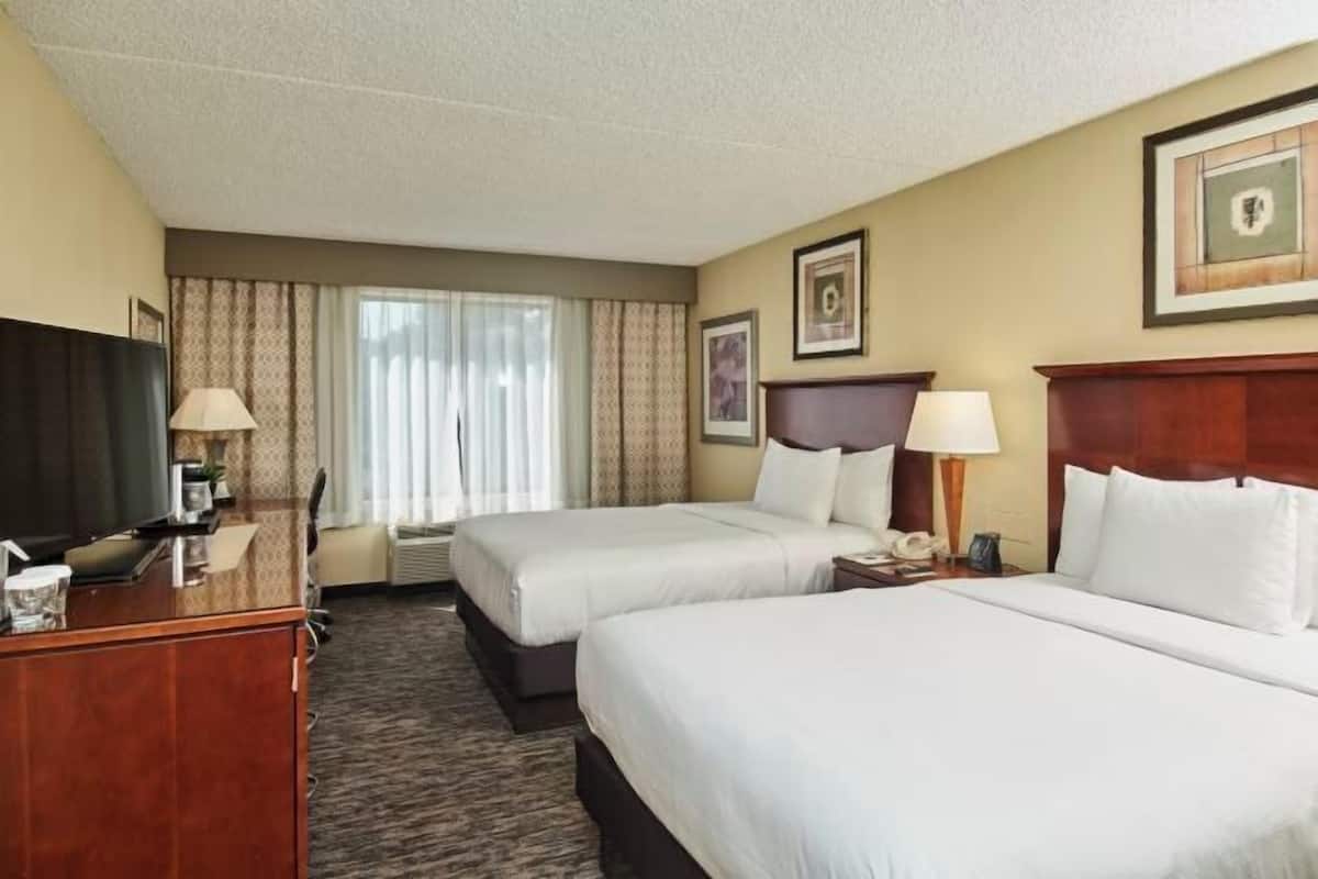 Premium bedding, down duvets, pillow-top beds, in-room safe