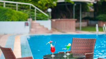 Seasonal outdoor pool, pool umbrellas