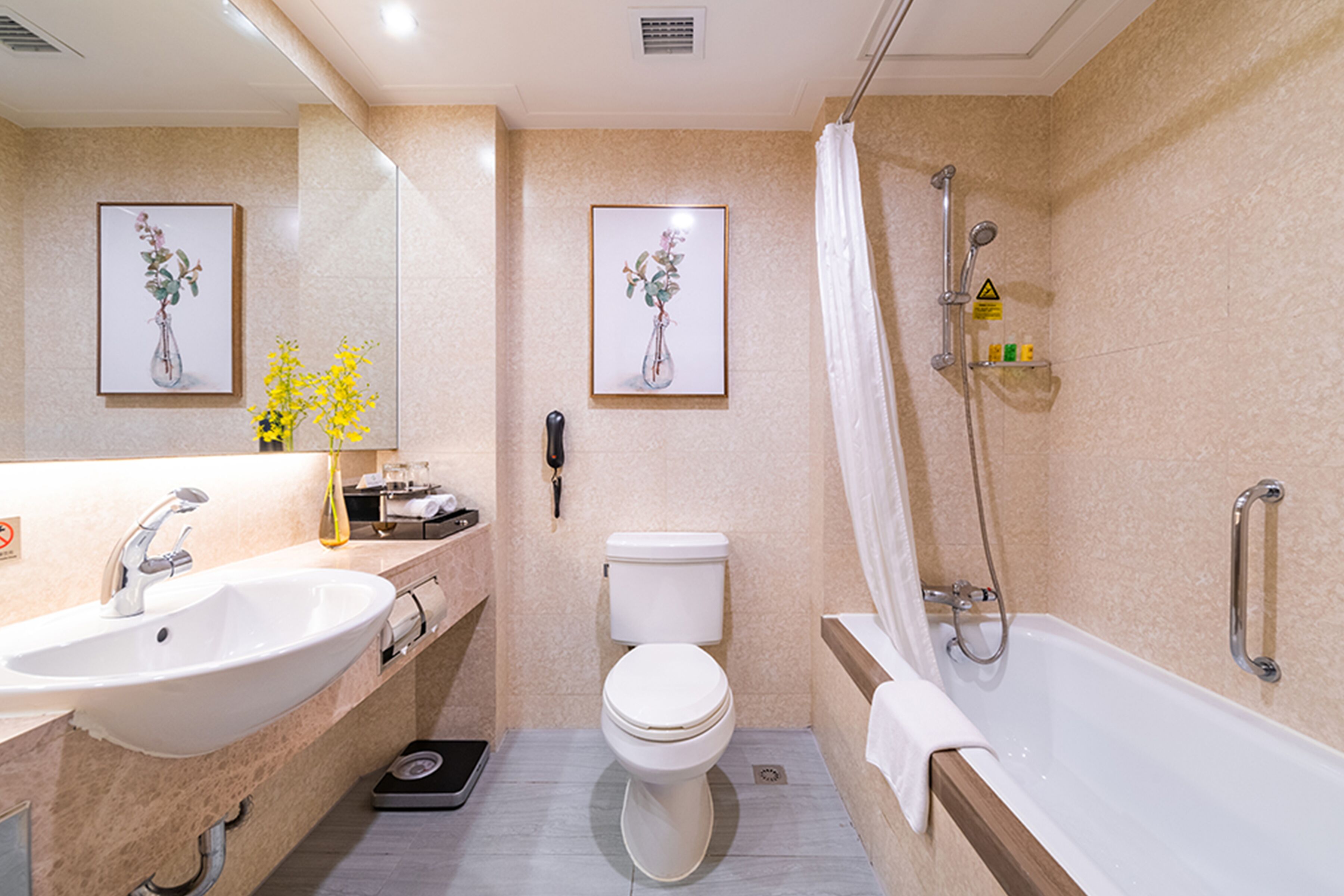 eco-friendly toiletries, hair dryer, bathrobes, slippers