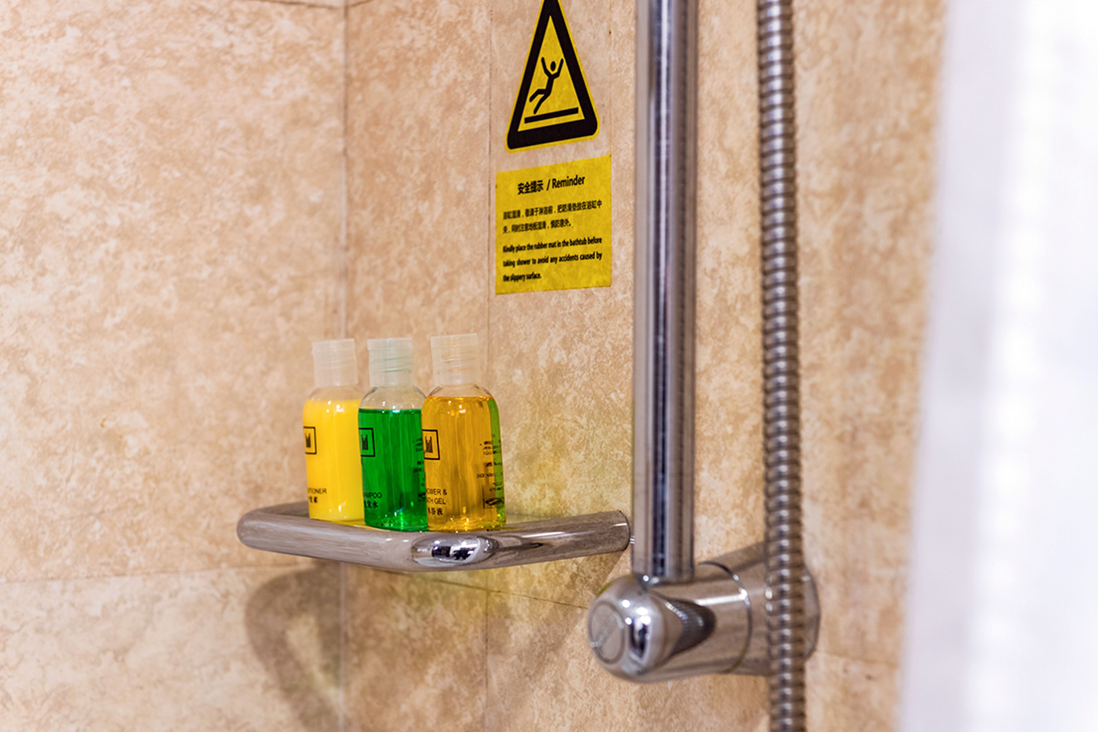 business twin room | bathroom | eco-friendly toiletries, hair dryer, bathrobes, slippers