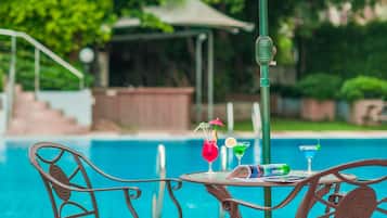 Seasonal outdoor pool, pool umbrellas