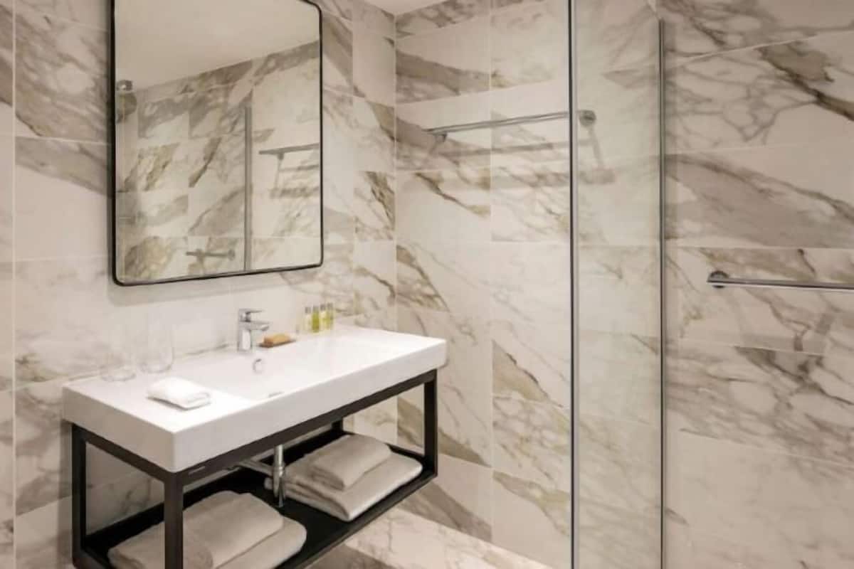 Eco-friendly toiletries, hair dryer, towels