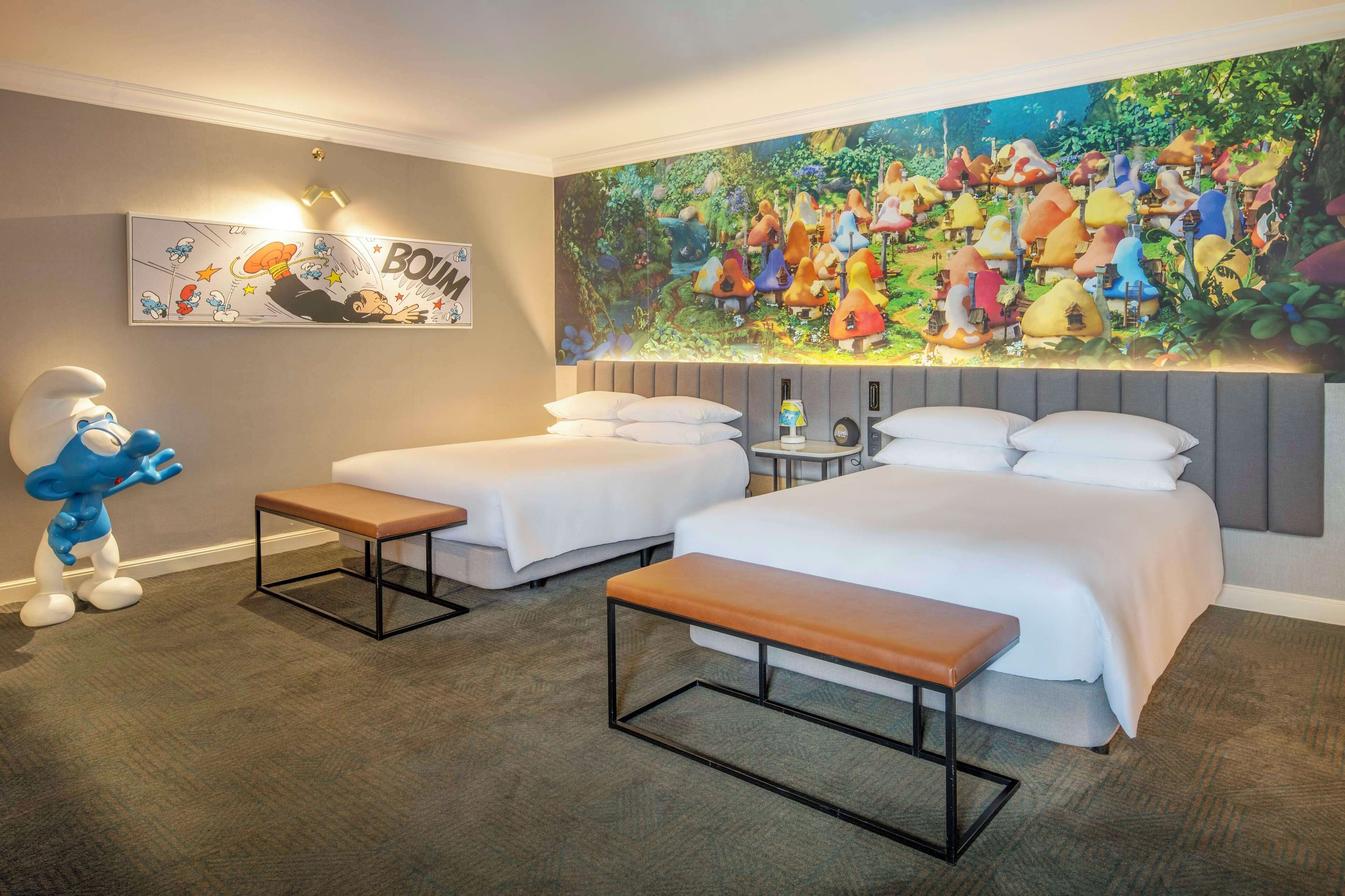 family room, 2 queen beds (fun smurf) | hypo-allergenic bedding, in-room safe, desk, laptop workspace