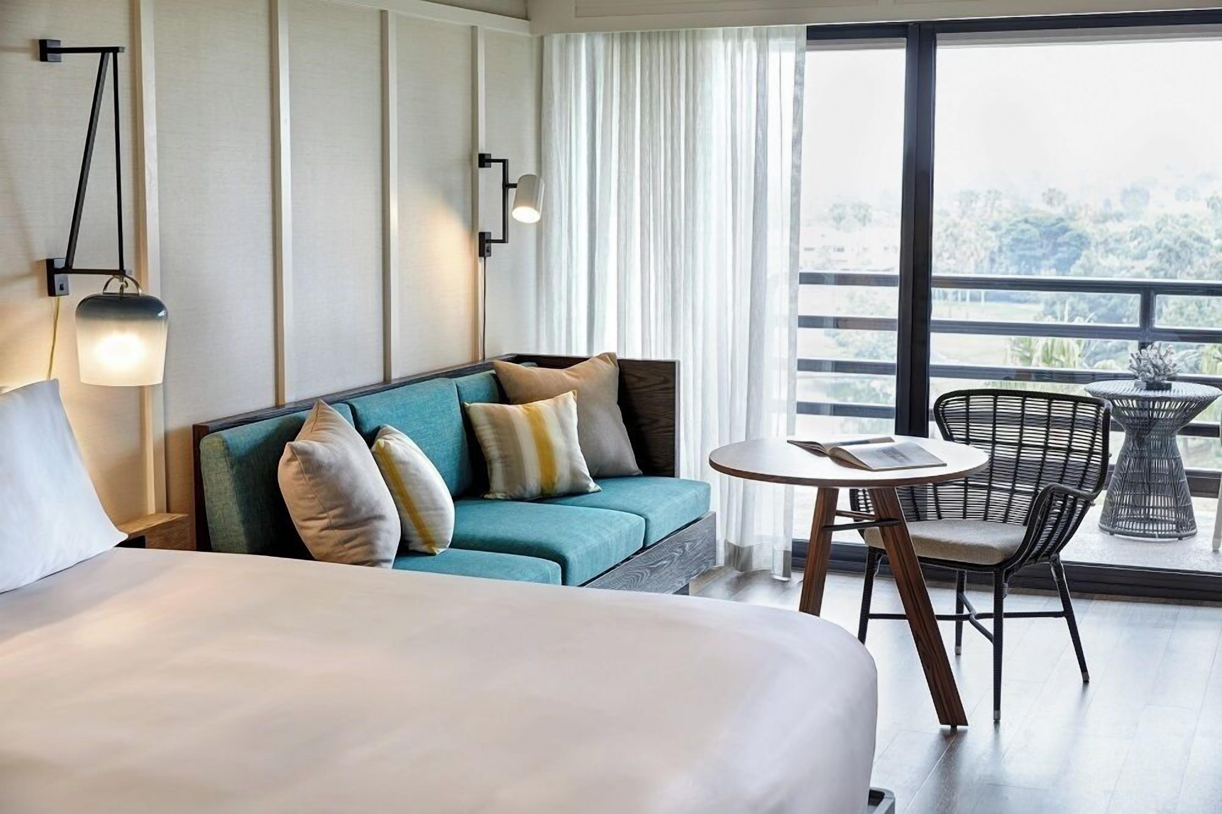 Down comforters, pillowtop beds, in-room safe, desk