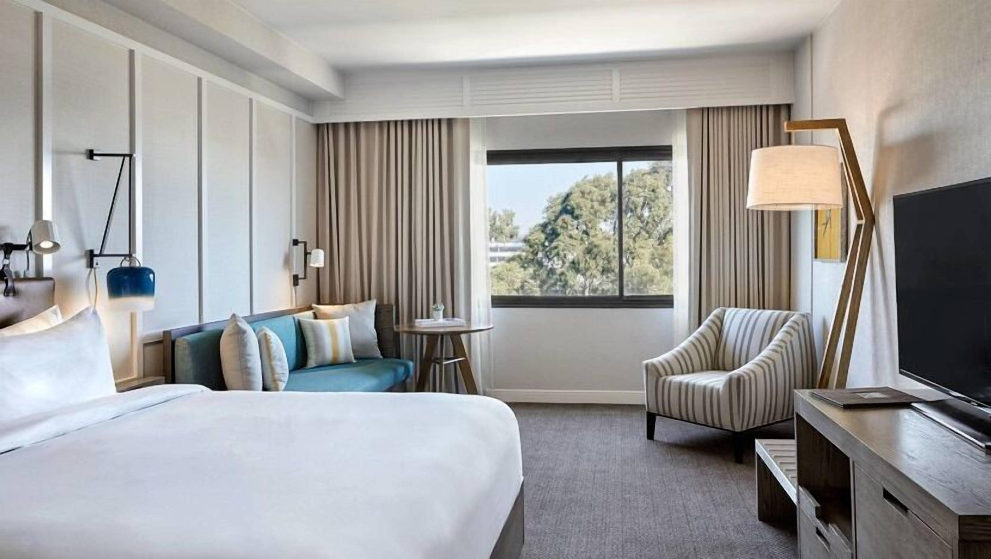 Down comforters, pillowtop beds, in-room safe, desk