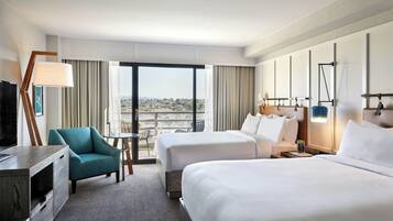 Down comforters, pillowtop beds, in-room safe, desk