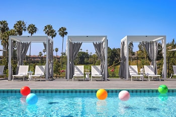 Outdoor pool, open 6:00 AM to 10:00 PM, free cabanas, pool umbrellas at Westdrift Manhattan Beach, Autograph Collection by Marriott