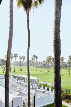 Outdoor pool, open 6:00 AM to 10:00 PM, free cabanas, pool umbrellas at Westdrift Manhattan Beach, Autograph Collection by Marriott