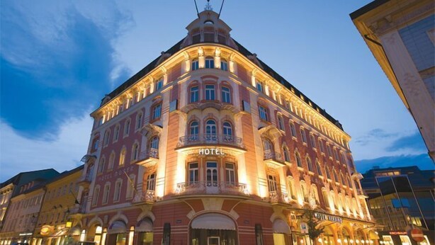 A historic hotel with a classic architectural style, featuring arched windows and a prominent entrance. - Garner Hotel Klagenfurt - Moser Verdino (Klagenfurt am Woerthersee)