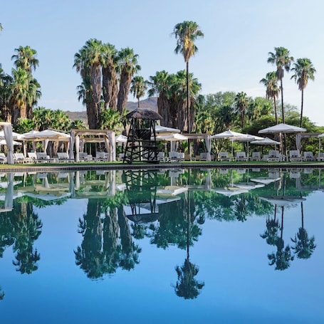 Outdoor pool, pool umbrellas, sun loungers