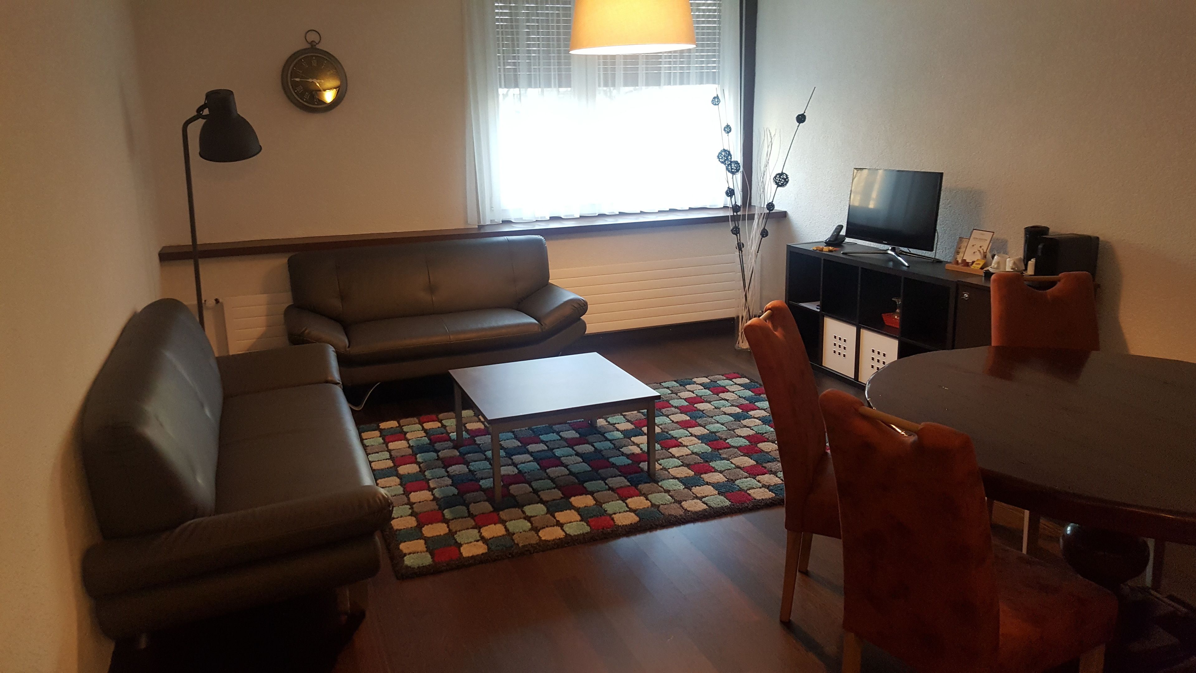 family room | minibar, in-room safe, desk, iron/ironing board