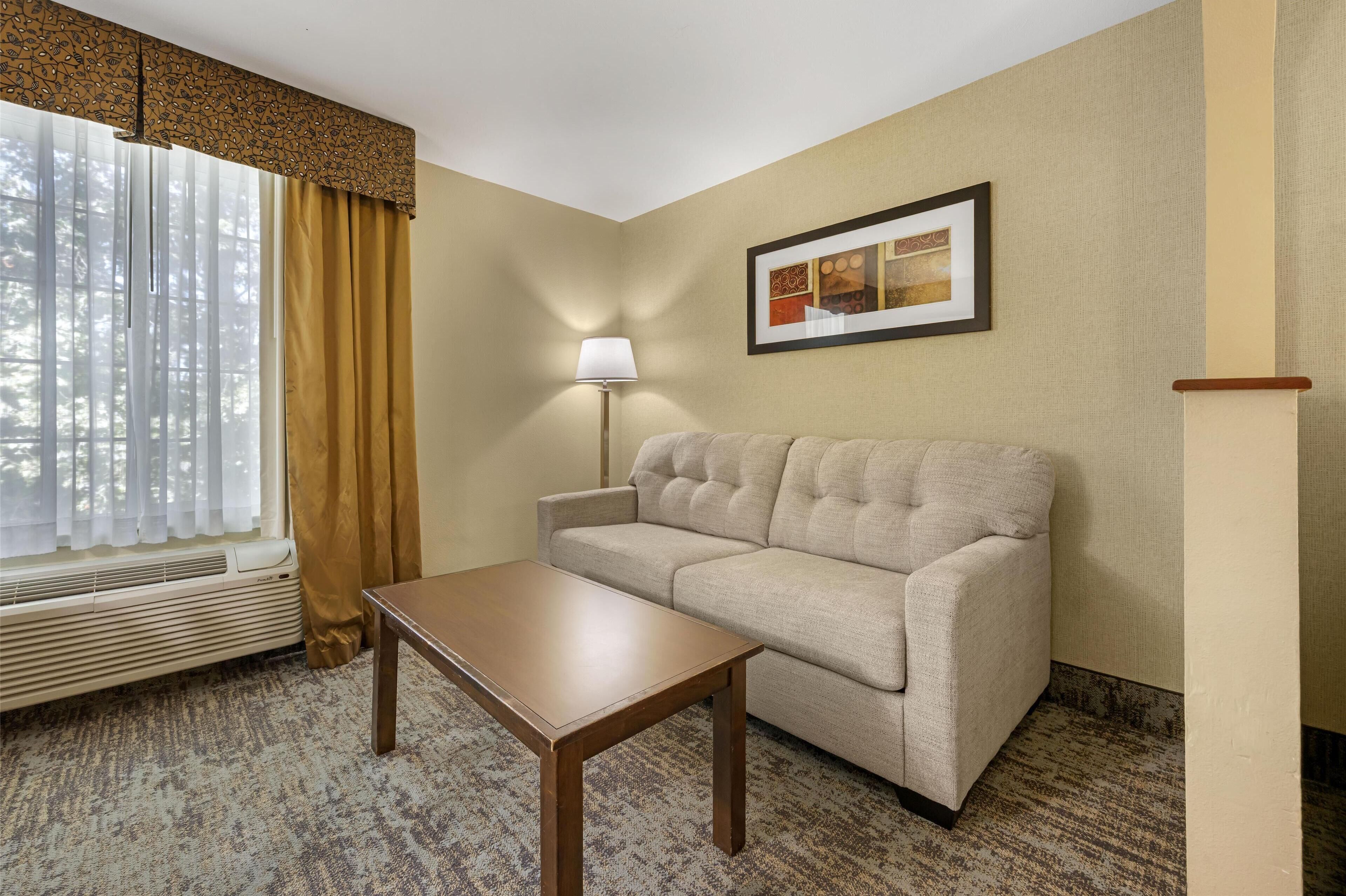 suite, 2 queen beds, non smoking, jetted tub (with sofabed) | premium bedding, desk, laptop workspace, blackout curtains