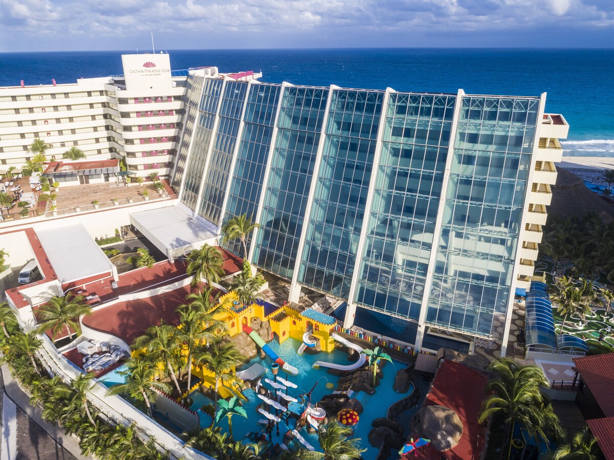 The resort building and water park at Crown Paradise Club Cancun
