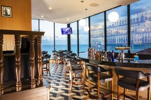4 bars/lounges, 2 poolside bars, swim-up bar, beach bar