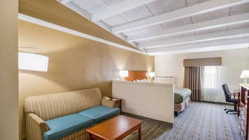 Suite, 1 King Bed with Sofa bed | In-room safe, desk, iron/ironing board, free cots/infant beds