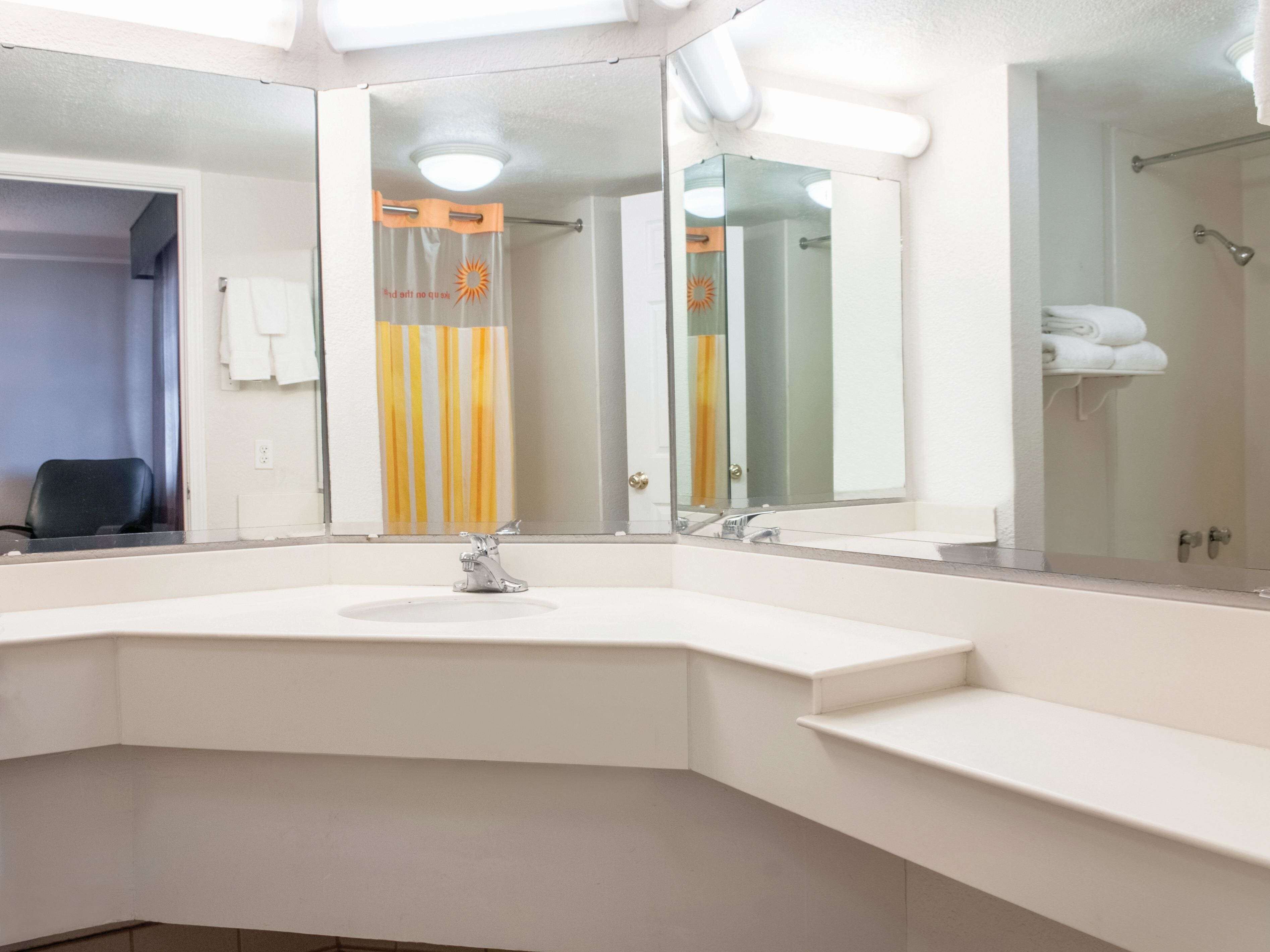 premium bedding, desk, laptop workspace, iron/ironing board