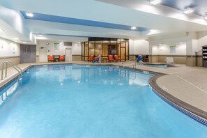 Indoor pool, open 5:00 AM to 11:00 PM, pool loungers