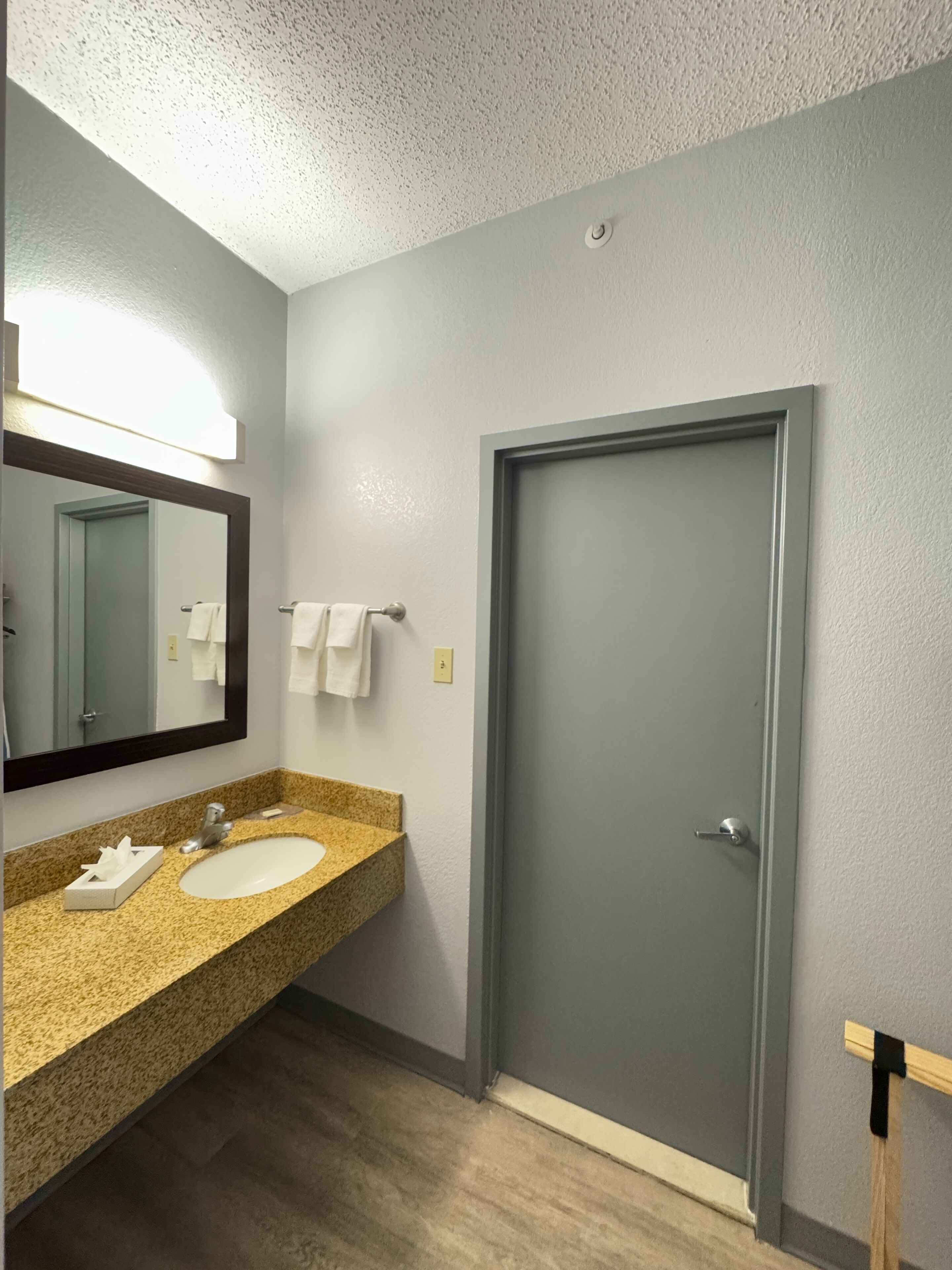 eco-friendly toiletries, hair dryer, towels