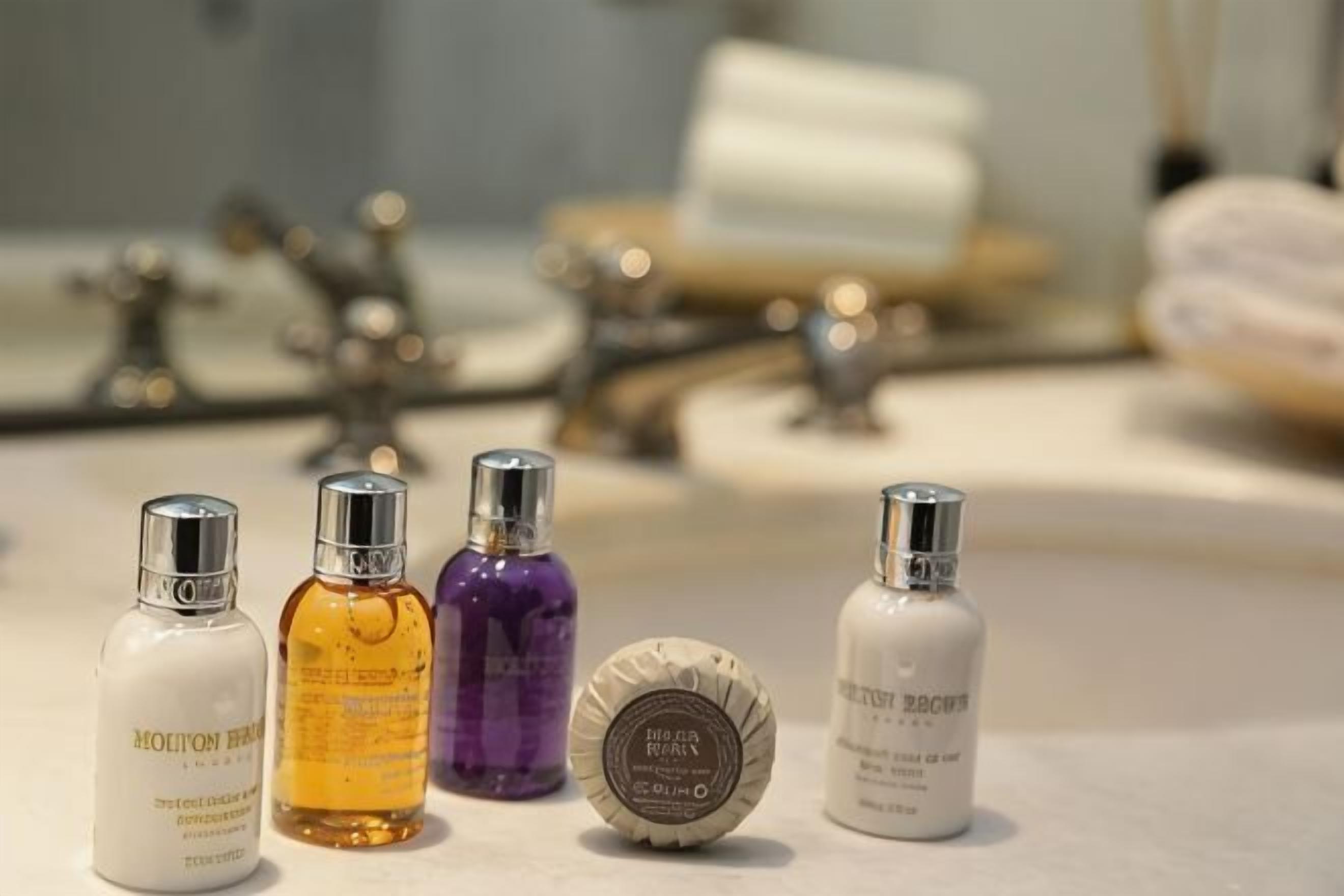 Bathroom amenities | Designer toiletries, hair dryer, bathrobes, slippers