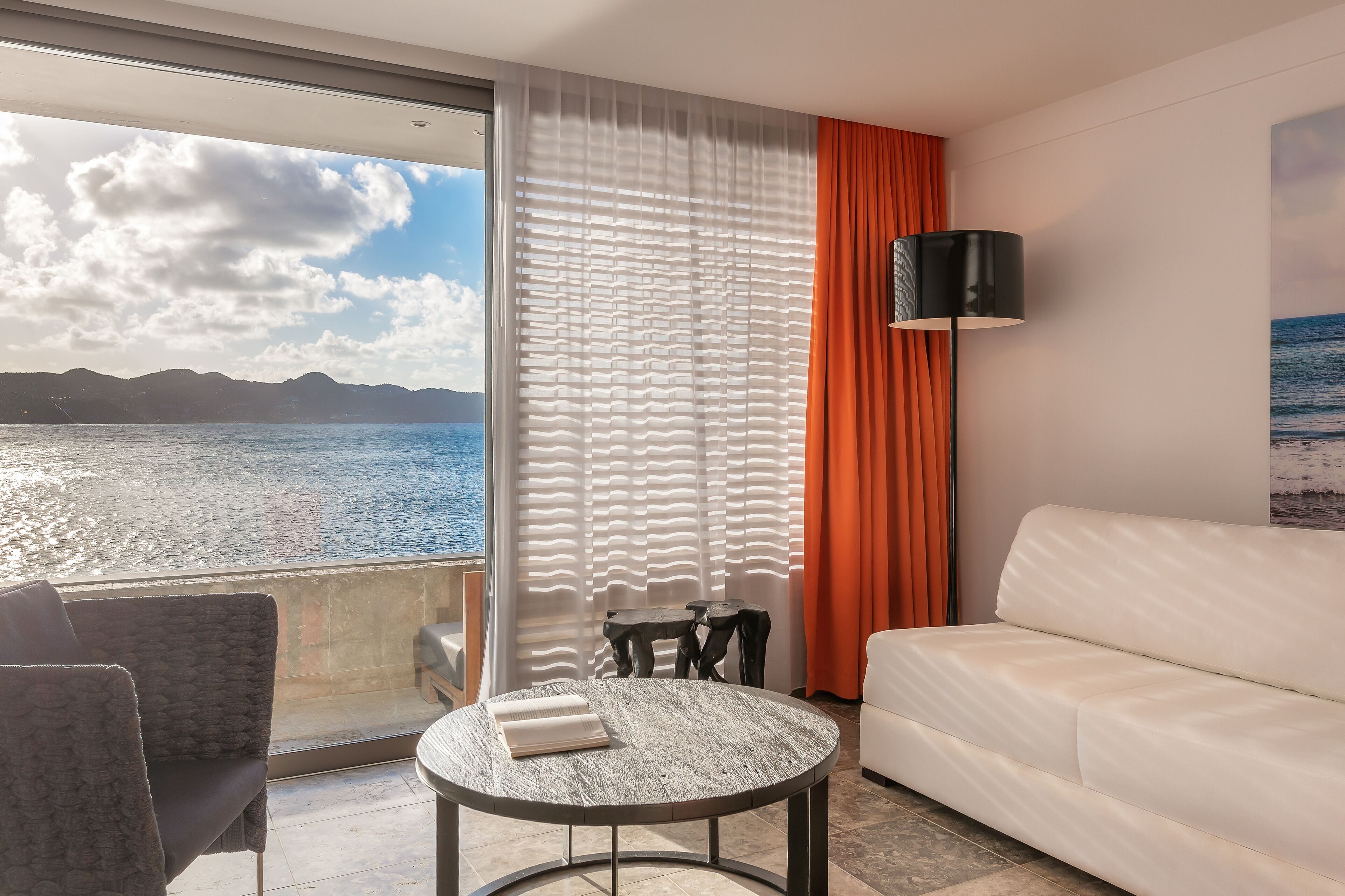 ocean panoramic junior suite | living area | plasma tv, dvd player, ipod dock, offices