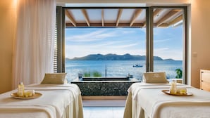 A room with two beds, a view of the sea, and a small pool. - Christopher Hotel (St. Barthelemy)