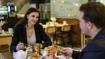 Daily buffet breakfast (EUR 23 per person)