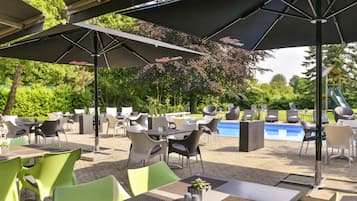 Seasonal outdoor pool, pool loungers