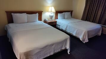 Cortinas blackout, Wi-Fi de cortesia, roupa de cama