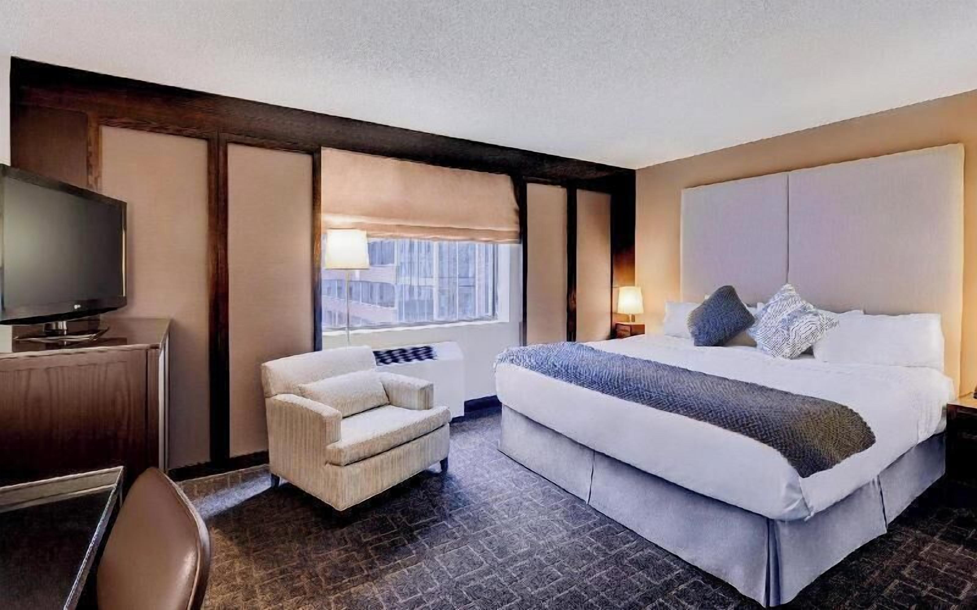 Premium bedding, memory-foam beds, in-room safe, desk