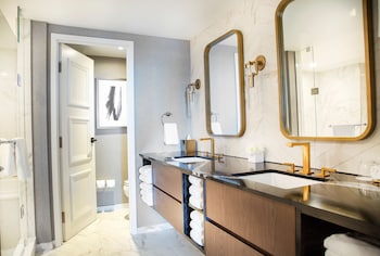 Suite, 1 King Bed (Royal Suite King) | Bathroom | Eco-friendly toiletries, hair dryer, bathrobes, towels at The Yorkville Royal Sonesta Hotel Toronto