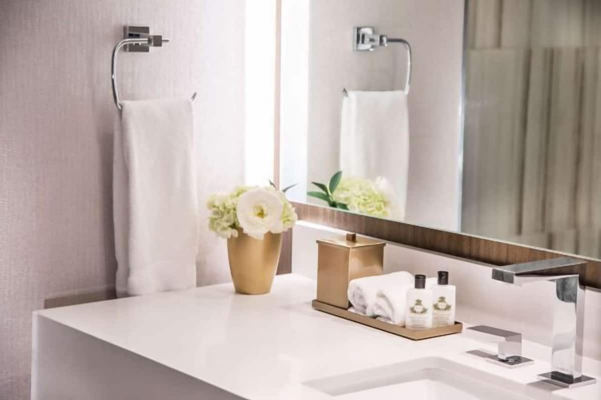 Eco-friendly toiletries, hair dryer, bathrobes, towels