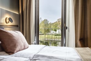 Superior Double Room, River View | Premium bedding, minibar, in-room safe, blackout drapes