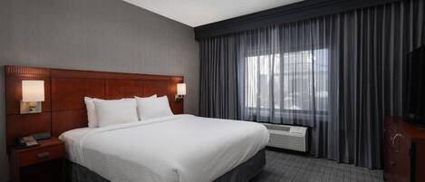 Premium bedding, pillowtop beds, desk, laptop workspace