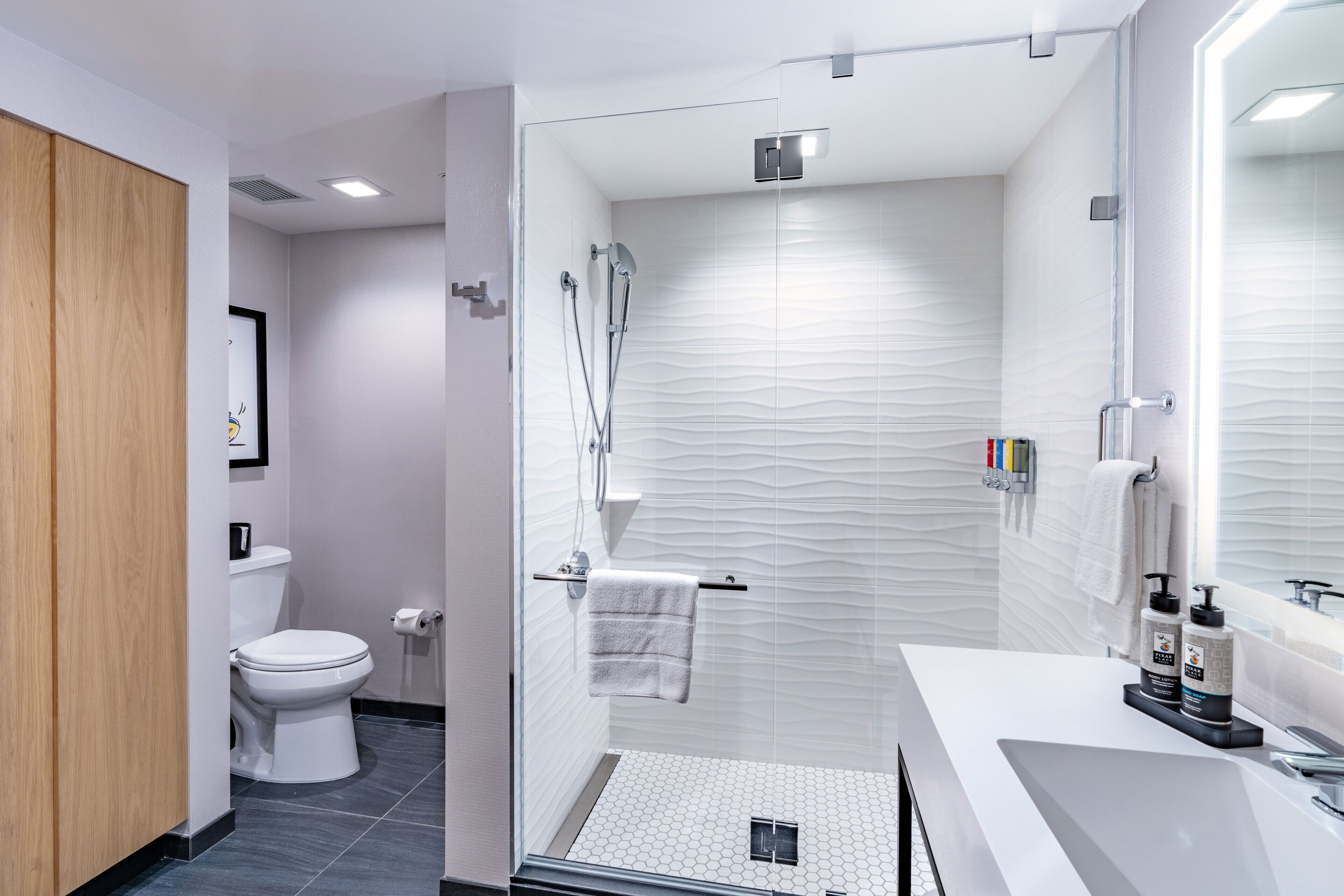 combined shower/bathtub, free toiletries, hair dryer, towels