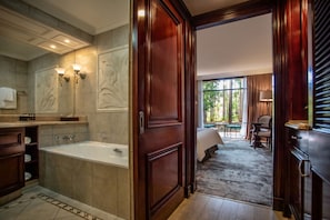 Superior Luxury Family Room | Bathroom | Separate tub and shower, eco-friendly toiletries, hair dryer, bathrobes