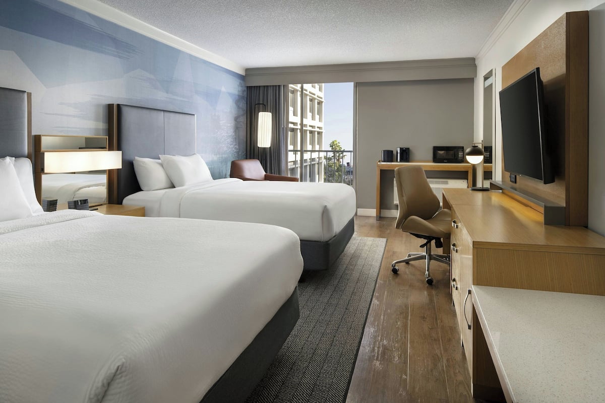 Premium bedding, down comforters, in-room safe, desk