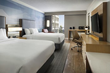 Premium bedding, down comforters, in-room safe, desk at Courtyard by Marriott Long Beach Downtown