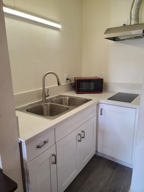 Kitchenette Room | Private kitchen | Eco-friendly cleaning products